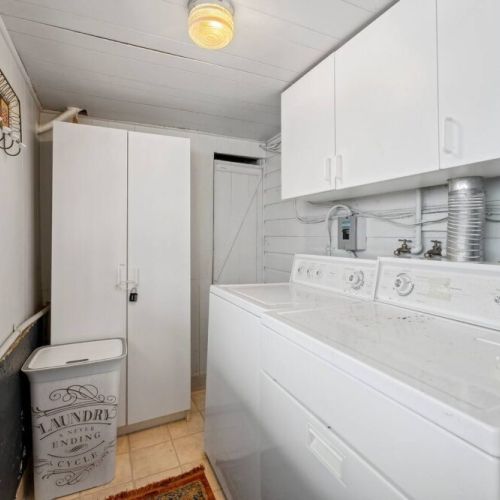 The laundry room includes a washer and dryer...but sho does laundry while on vacation?