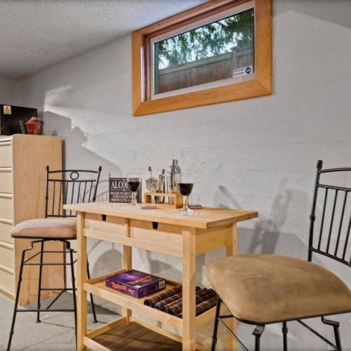 The cozy seating area invites relaxation.  Perfect for savoring a glass of wine and celebrating life's moments.