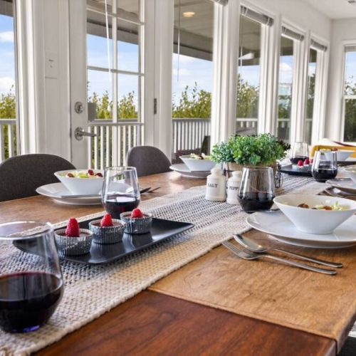 Stunning dining tale overlooks a breathtaking view. The perfect setting to savor culinary delights while enjoying the beauty of nature.
