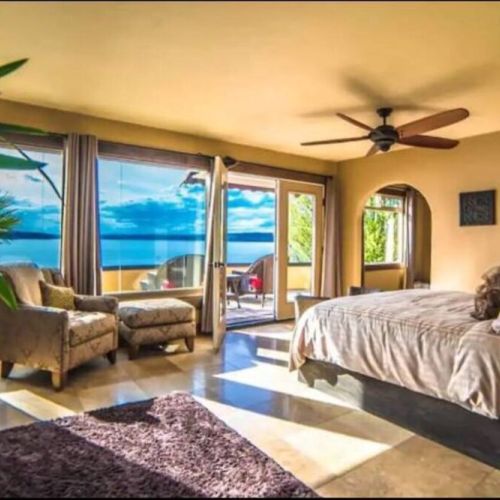 Wake up to this view in the King En Suite with its wall of windows. What a great way to start your day!