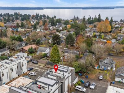 Peek-a-boo views of the water, Vashon Island, and Olympic Mountains from the rooftop deck. EcoFriendly BnBs welcomes you to your PNW adventure.