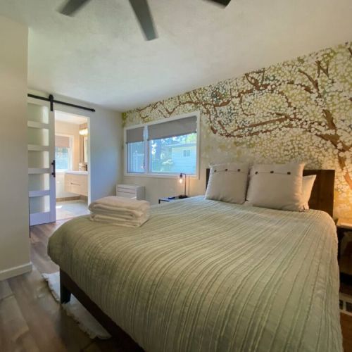 Settle in to the En Suite bedroom with its 55" Smart TV and double closet while enjoying the comforts of the luxurious bathroom.