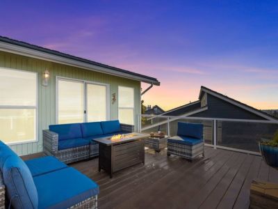 The upper deck is accessible from the kitchen and the king en suite bedroom