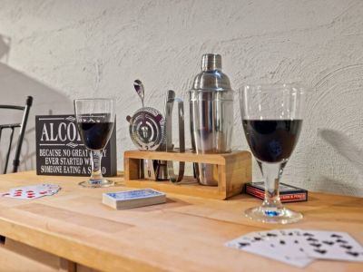 Unwind and raise a glass in the inviting ambiance of this basement level. An ideal setting for creating cherished memories and toasting to good times.