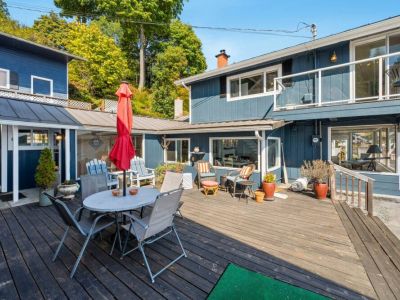 Surrounded by the gentle sound of waves providing a serene and tranquil atmosphere on this open aired deck.