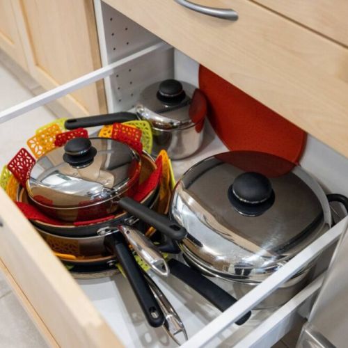 A collection of well-stocked pots and pans, ready to tackle any cooking endeavor. These pots and pans will elevate your cooking experience and inspire delicious culinary creations.