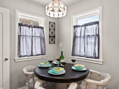 Cozy cottage kitchen dining nook is perfect for morning tea and coffee. Additional dining seating  is available in the living room.