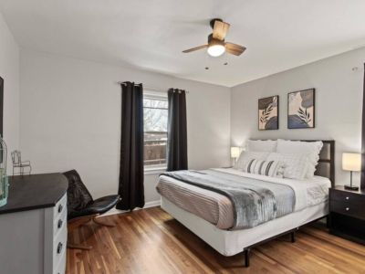 The spacious main floor queen bedroom  has  a three drawer dresser and black out curtains to ensure a good night’s sleep.