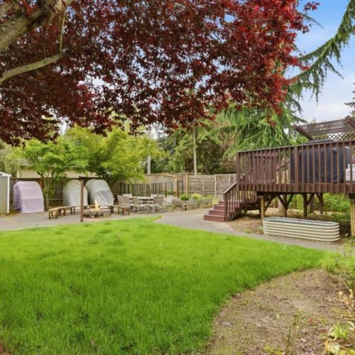 Pets and kids enjoy the fully fenced backyard.