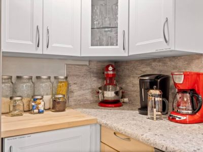 Savor your perfect cup of coffee with this coffee lover's dream setup featuring a Keurig reusable K-Cup system, a 12-cup coffee maker, and a classic French press.