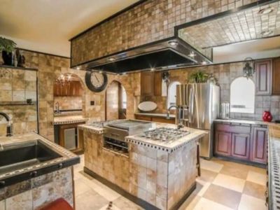 Large kitchen with plenty of space to gather in while cooking and baking family favorites. This culinary sanctuary is a haven for gastronomic adventures...