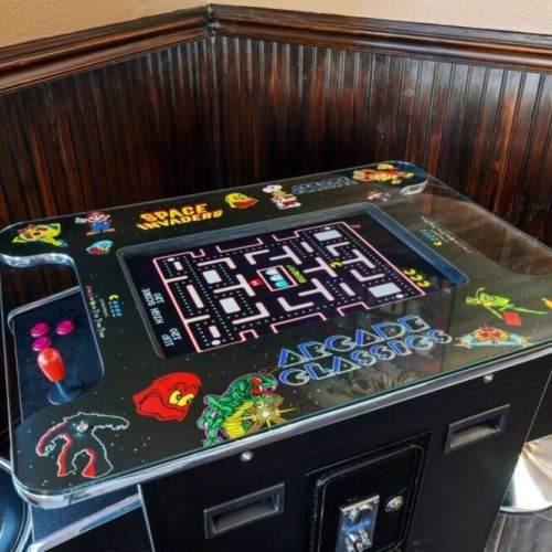 Gather around the 60 arcade cocktail table and let the fun begin! This nostalgic and entertaining centerpiece offers a wide selection of classic arcade games, providing hours of enjoyment for all ages