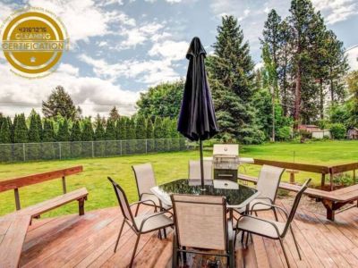Enjoy hanging out on the large deck overlooking the huge fully fenced backyard.