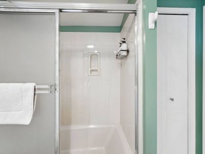 Enjoy 100% plant based eco-frendly soaps, shampoo, conditioner, and body wash. The linen closet doubles as a closet for the Queen bedroom.