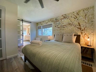 Settle in to the En Suite bedroom with its 55" Smart TV and double closet while enjoying the comforts of the luxurious bathroom.