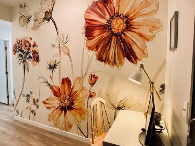 The spacious entry hall has a workstation tucked away from the main living area.