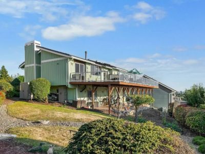 Waterview Haven has an upper deck and a lower covered patio, both with water views, and is currently unfenced.