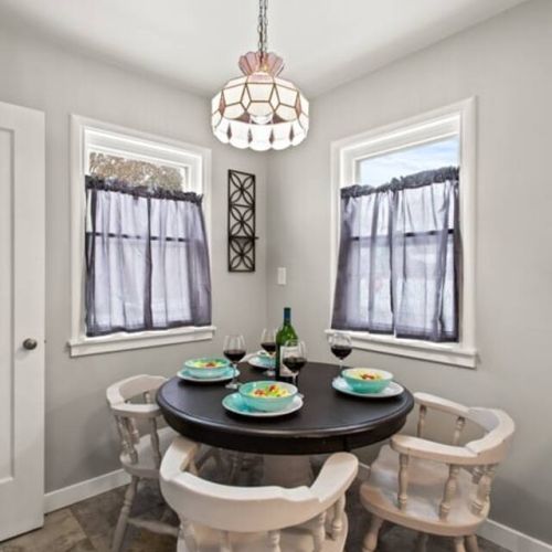 Cozy cottage kitchen dining nook is perfect for morning tea and coffee. Additional dining seating  is available in the living room.