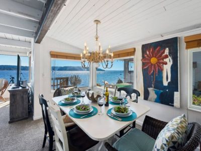 The interior's warmth and comfort with an open-concept design invites you with an awe-inspiring view.