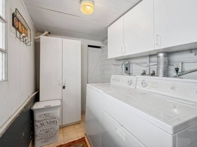 The laundry room includes a washer and dryer...but sho does laundry while on vacation?