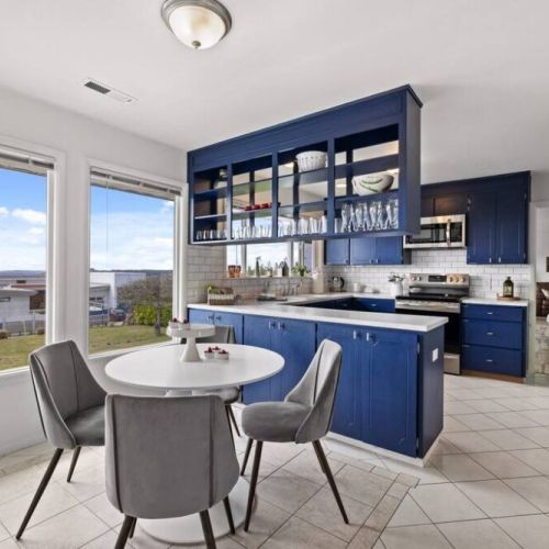 Nestled within the heart of the spacious kitchen is a delightful nook. Perfect for savoring a hot cup of coffee or enjoying a quick bite.