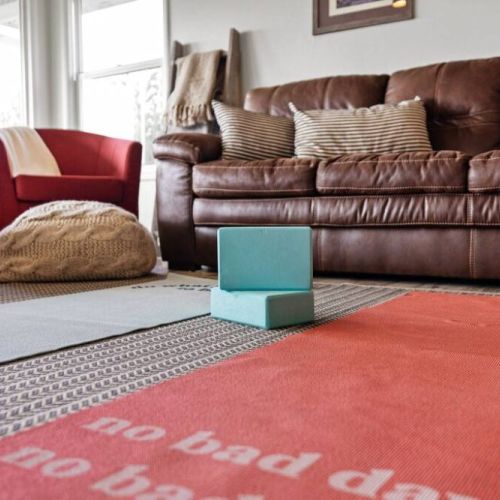 Next to this comfy sofa are yoga mats. Time for you to unroll to tranquility and inner balance.