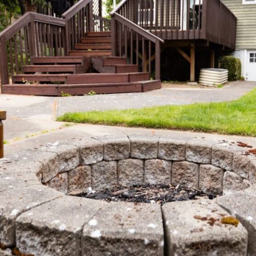 PNW aged brick adds ambiance to the fire pit.
