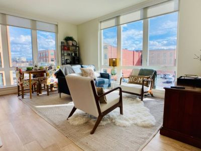 Cozy open concept living space with living, dining, and kitchen.