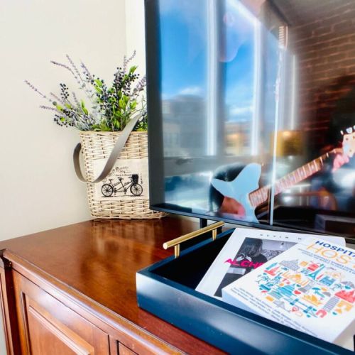 Enjoy watching your favorite shows and movies on the 50" Smart TV or peruse the book of art by Kevin Max...or read a chapter in the book that I co-authored.

Sit. Stay.  Relax.