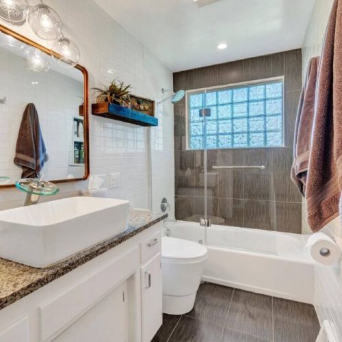 Experience the luxury and style in our newly remodeled full bath. Indulge in the spaciousness, sleek finishes and elegant fixtures modern design.