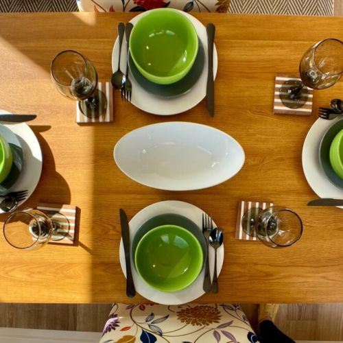 Stylish Ceramic dinnerware and stainless steel silverware make every occasion a special occasion.