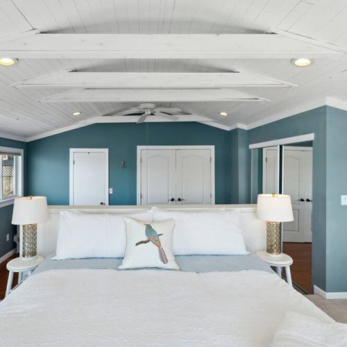 This luxurious bedroom is a haven of serenity, designed to offer an unparalleled connection with nature.