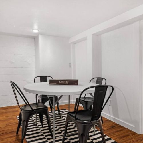 Discover the versatility of our space with an additional dining and/or game and puzzle table, perfect for entertaining and leisurely activities.