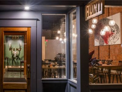 Hunt, located across the street, is a unique experience. Walk down the 115 yr old stairs and find a seat in history.