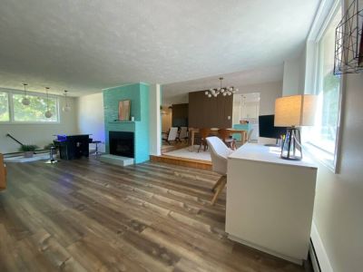 Second living room with Arcade game table, Office desk, Library console table, and Italian leather sofa