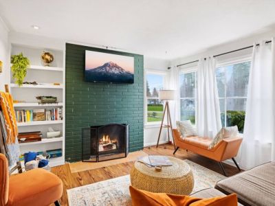 Step into our inviting main floor living room. This cozy and welcoming space is perfect for gathering with loved ones or enjoying a quiet moment of relaxation.