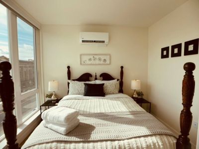 Created for cozy nights and lazy mornings. Full length windows provide lots of light while full length window darkening shades provide privacy.