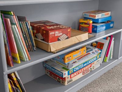 A collection of kids' books and toys. From beloved storybooks to interactive games that they will enjoy