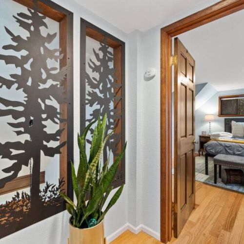 Welcome To The "Treehouse" Loft and experience the modern charm of loft living with this stunning space that blends industrial design with contemporary elegance.