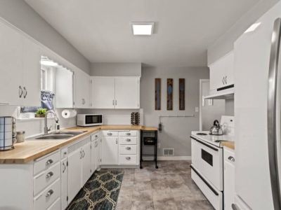 Step into our bright and fully stocked kitchen. With all the essentials at your fingertips, cooking is a  breeze.