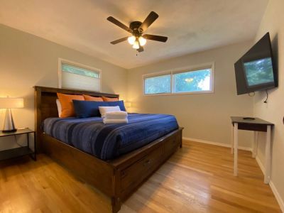 Sink into blissful comfort of our luxurious king bed, where you can unwind and enjoy your favorite movie in style on the 55" Smart TV.