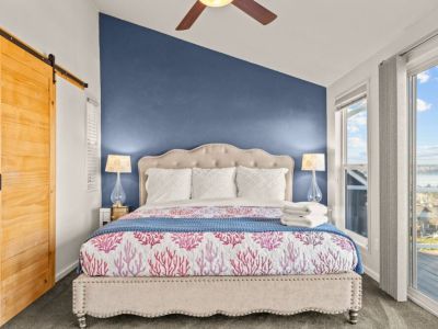 Enjoy the comforts of a private bathroom, walk-in closet, and the 55" smart TV...perfect for cozy nights.