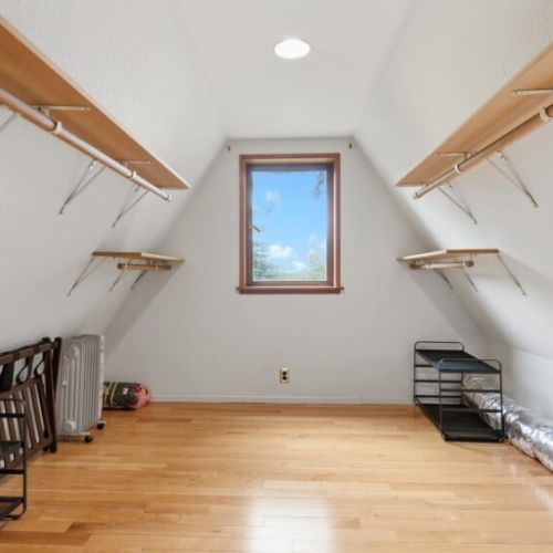 A large walk-in closet for the Treehouse Loft King Bedroom.