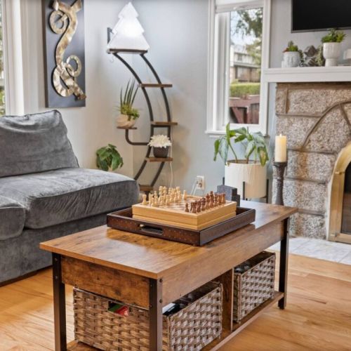 Curl up on the plush sofa, savoring a hot cup of cocoa or a good book next to this inviting ambiance of our cozy gas fireplace.