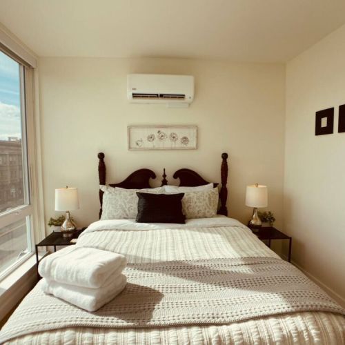 Created for cozy nights and lazy mornings. Full length windows provide lots of light while full length window darkening shades provide privacy.