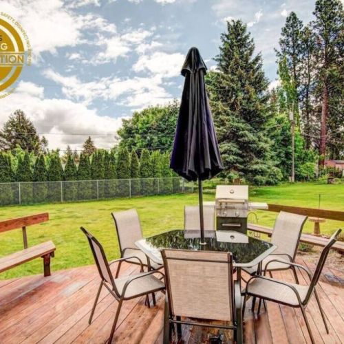 Enjoy hanging out on the large deck overlooking the huge fully fenced backyard.