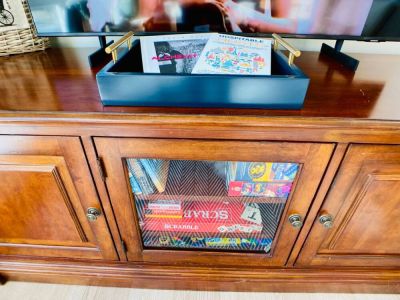 Board games, card games, puzzles, and books for indoor fun.