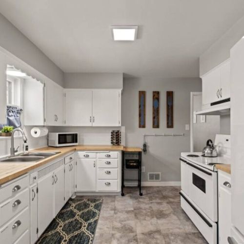 Step into our bright and fully stocked kitchen. With all the essentials at your fingertips, cooking is a  breeze.