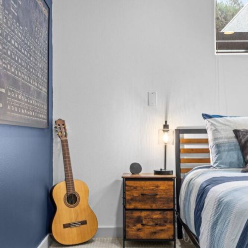 Main Floor Queen Bedroom with Smart TV