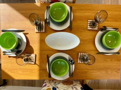 Stylish Ceramic dinnerware and stainless steel silverware make every occasion a special occasion.